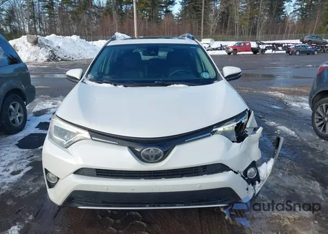 2017 Toyota Rav4 Limited z USA, uszkodzony, nr VIN JTMYFREV8HJ120953